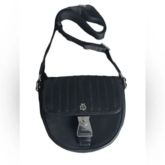 Luxurious “Never Still” Crossbody Saddlebag by Rimowa Exclusive - Picture 3 of 10
